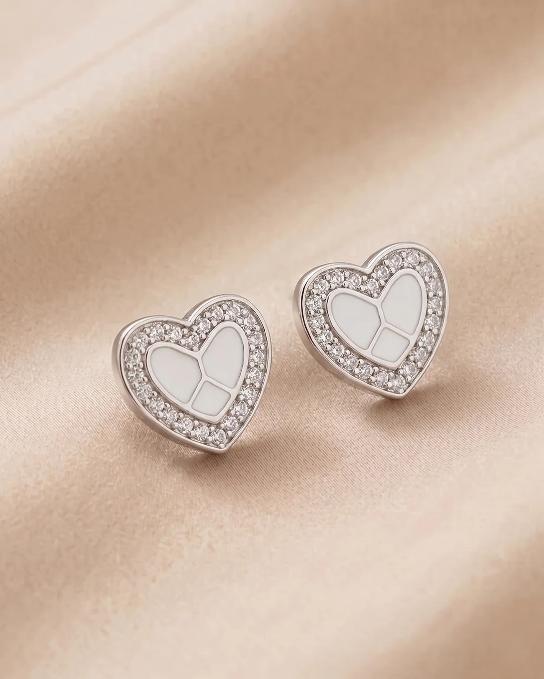 Twinkle Heart Studs in 92.5 Silver
